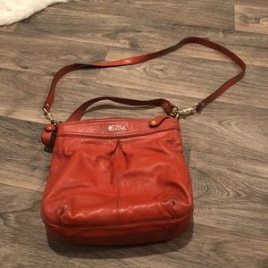 Coach burnt orange cross body purse